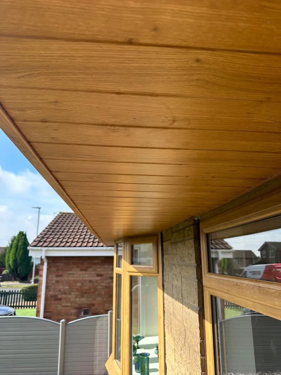 Golden oak soffit board detail viewed from below