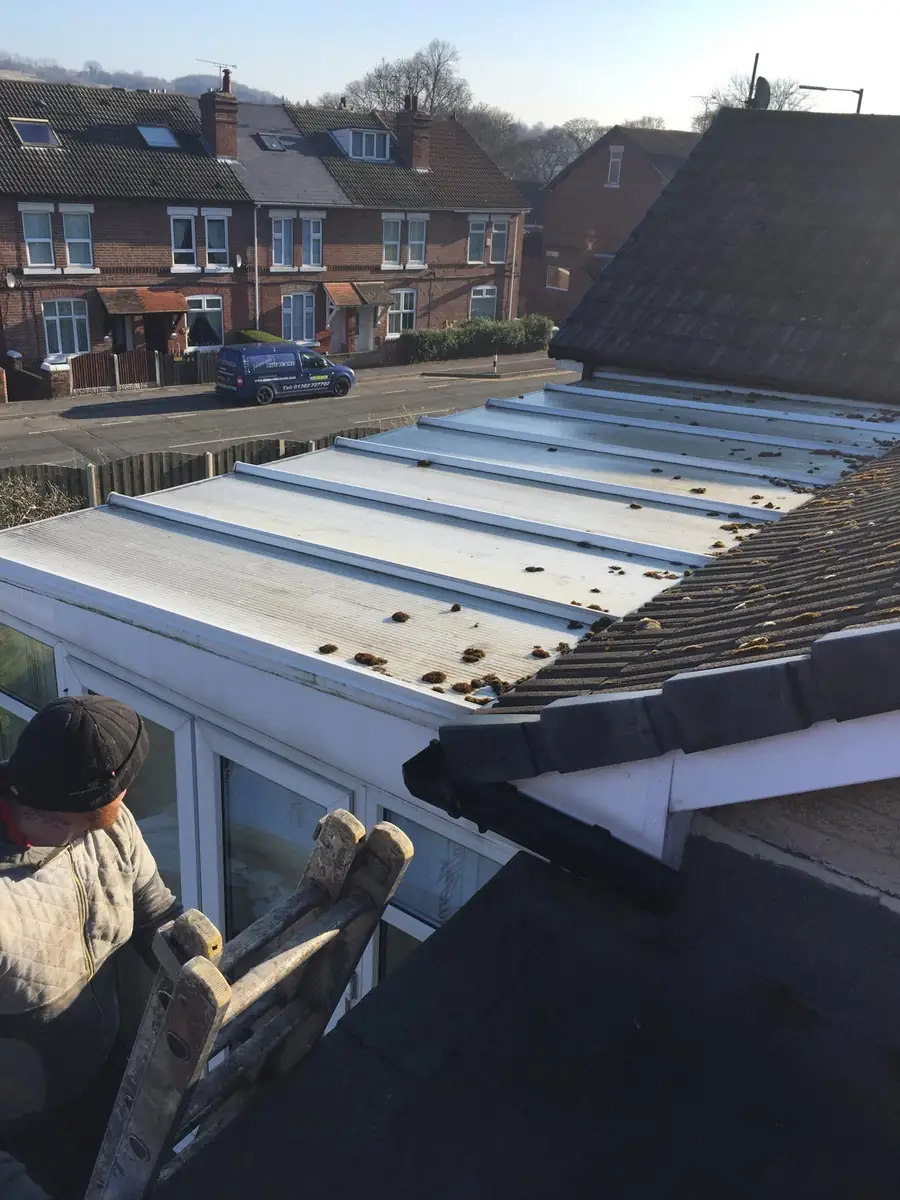 Insulated panels laid across a rear extension roof before the membrane